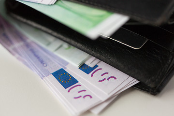 Image showing close up of euro paper money in wallet