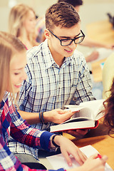 Image showing group of smiling students with books