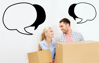 Image showing couple with delivery boxes moving to new home