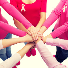 Image showing close up of women with cancer awareness ribbons