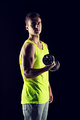 Image showing young man with dumbbell