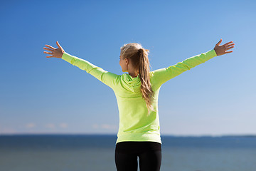 Image showing woman doing sports outdoors