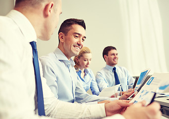 Image showing smiling business people meeting in office