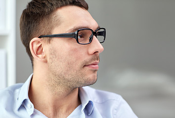 Image showing portrait of businessman in eyeglasses at office