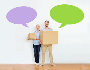 Image showing couple with cardboard boxes moving to new home