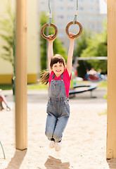 Image showing happy little girl on children playground