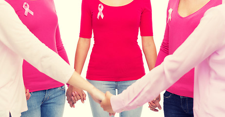 Image showing close up of women with cancer awareness ribbons