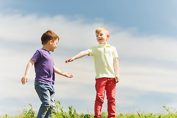 Image showing happy little boys outdoors