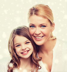 Image showing smiling mother and little girl