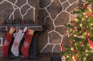 Image showing Christmas stockings and tree