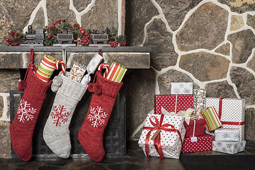 Image showing Christmas stockings\r and presents