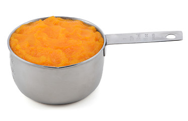 Image showing Pureed pumpkin in a measuring cup