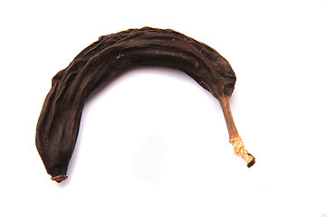 Image showing old black banana isolated