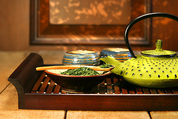 Image showing Green cast iron teapot