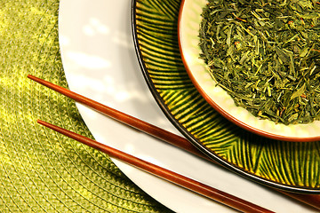 Image showing Asian bowls filled with herbs