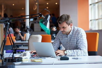 Image showing startup business, software developer working on computer