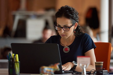 Image showing startup business, woman  working on laptop