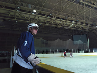 Image showing hockey players on bench