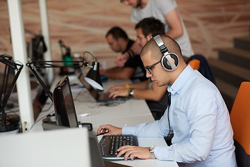 Image showing startup business, software developer working on computer