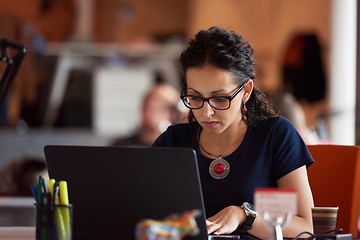 Image showing startup business, woman  working on laptop