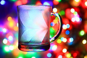 Image showing glass cup on the christmas lights\r\n