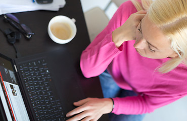 Image showing Business woman working from home.