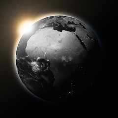Image showing Sun over Africa on dark planet Earth