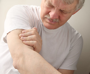 Image showing senior man with arm pain	