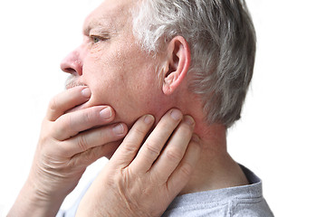 Image showing senior with neck and jaw stiffness