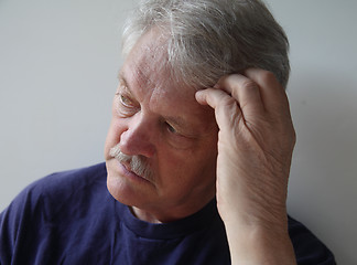 Image showing man with a thoughtful look	