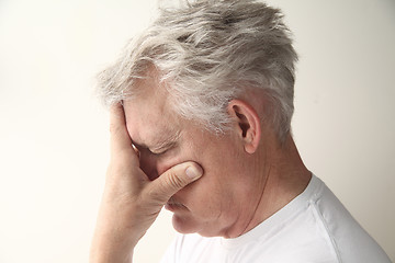 Image showing older man depressed or grieving	