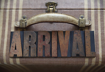 Image showing arrival word on old luggage