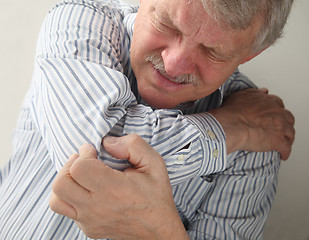 Image showing senior man with painful joints