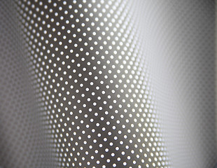 Image showing curving gray and white polka dot background