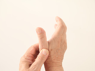 Image showing man has an aching thumb	