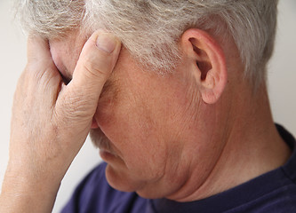 Image showing older man depressed or grieving	