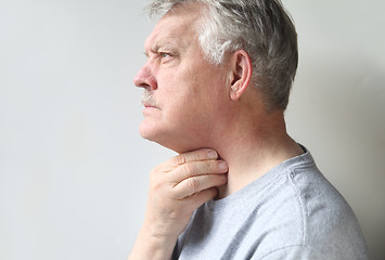 Image showing man with throat pain