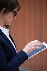 Image showing business woman working on tablet