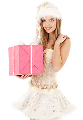 Image showing santa helper in corset and skirt with pink gift box