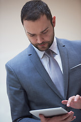 Image showing business man with tablet