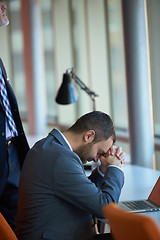 Image showing frustrated young business man at office