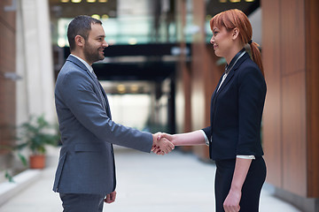 Image showing business man and woman hand shake