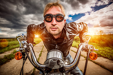 Image showing Biker on a motorcycle