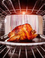 Image showing Roast chicken in the oven.