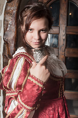 Image showing Attractive woman in red dress in retro baroque style