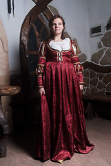 Image showing Attractive woman in red dress in retro baroque style