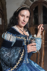 Image showing Attractive woman in red dress in retro baroque style