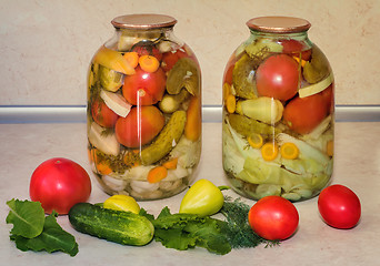 Image showing  A variety of canned vegetables in glass jars.