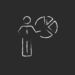 Image showing Businessman pointing at the pie chart icon drawn in chalk.