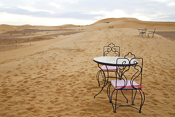 Image showing table and seat in   yellow sand